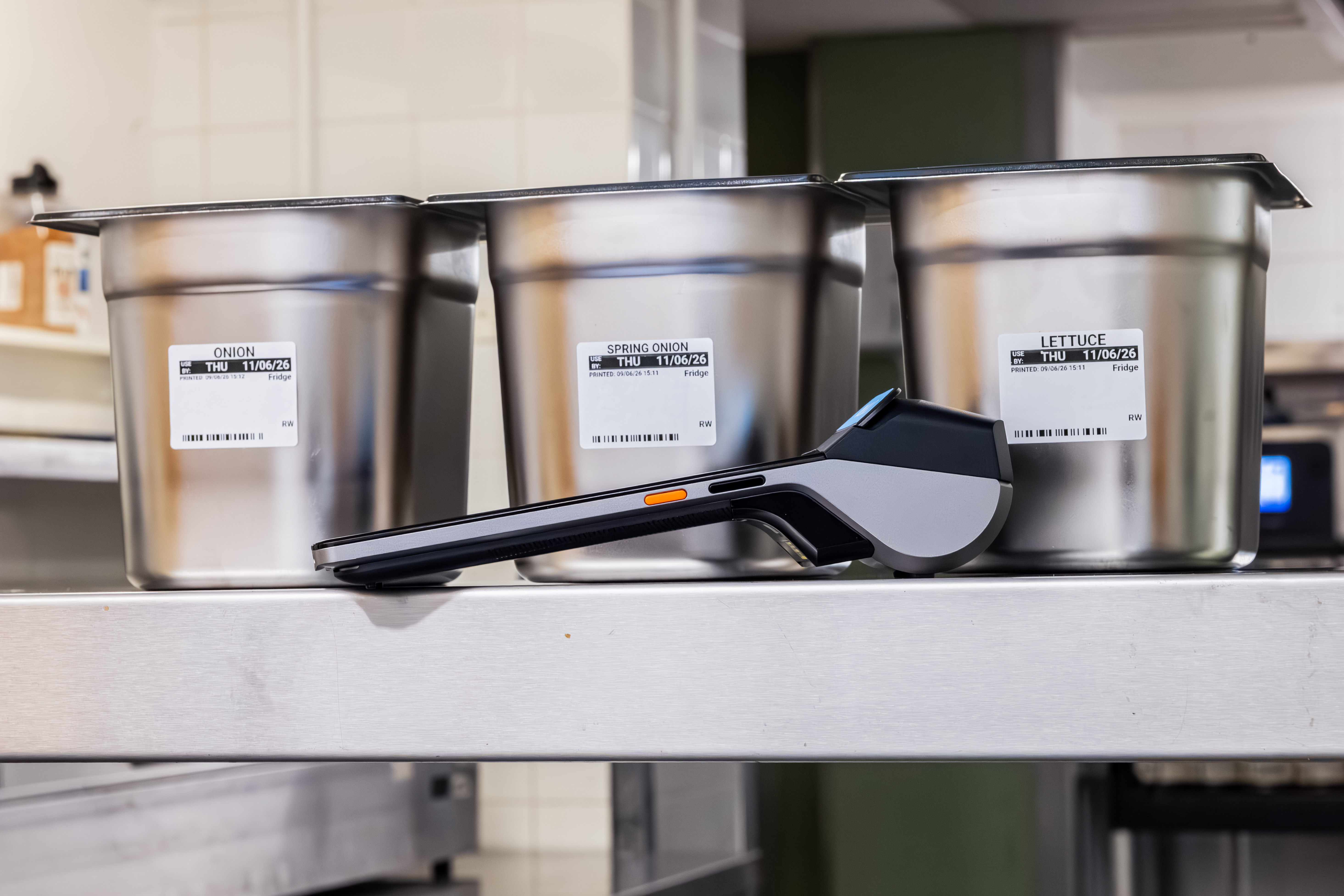 Labl.it device with labeled containers in a commercial kitchen